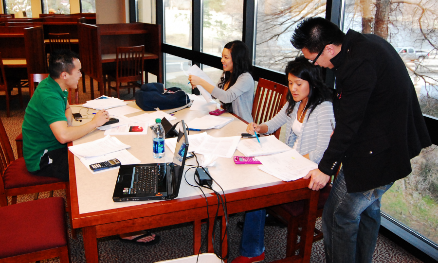 Students gather in the library to study