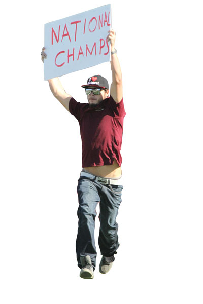 National champion Zach Worden celebrates his victory at the homecoming football game Saturday.
