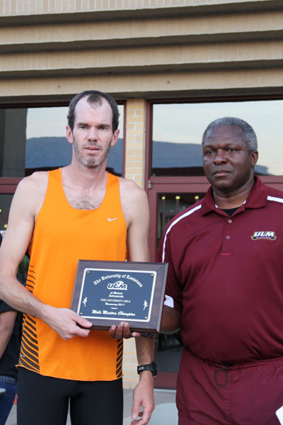 First-place winner Morgan Smith poses with trophy plaque.