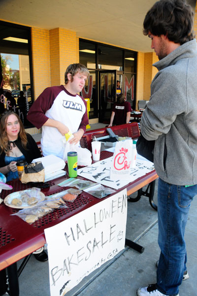 John Sanders works the table at the bake sale in effort to raise money for th GSA