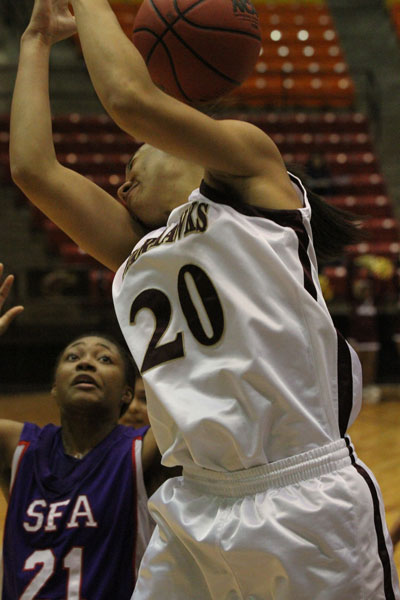Ashleigh Simmons mishandles a rebound in Friday night’s loss to Stephen F. Austin at the Fant-Ewing Coliseum.