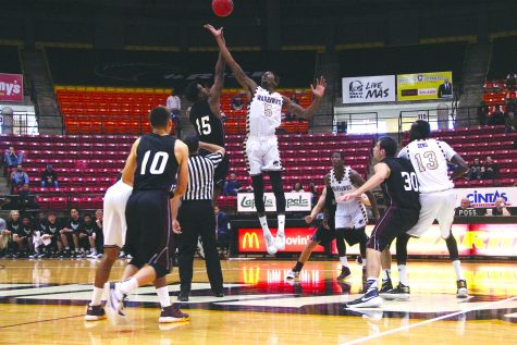 Men’s basketball team bounces into history