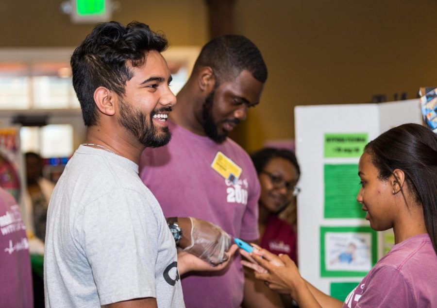 Manzil Rayamajhi getting his blood sugar levels checked at the first Health Festival last week. 