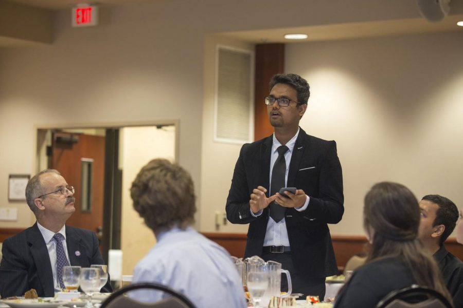 LETS TALK: SGA Senator Sachin Thapa asks a question during Lunch with the President last week.