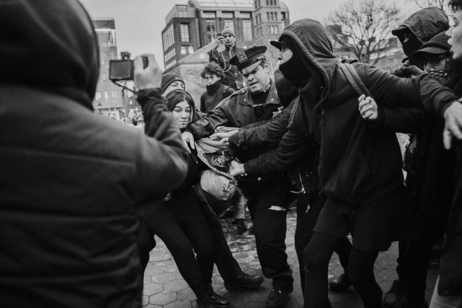 CONFLICT IN THE BIG APPLE: Siddarth Gaulee won third place in the on-site photo shootout competition for capturing this violent altercation at the International Womens Day Rally in NYC.