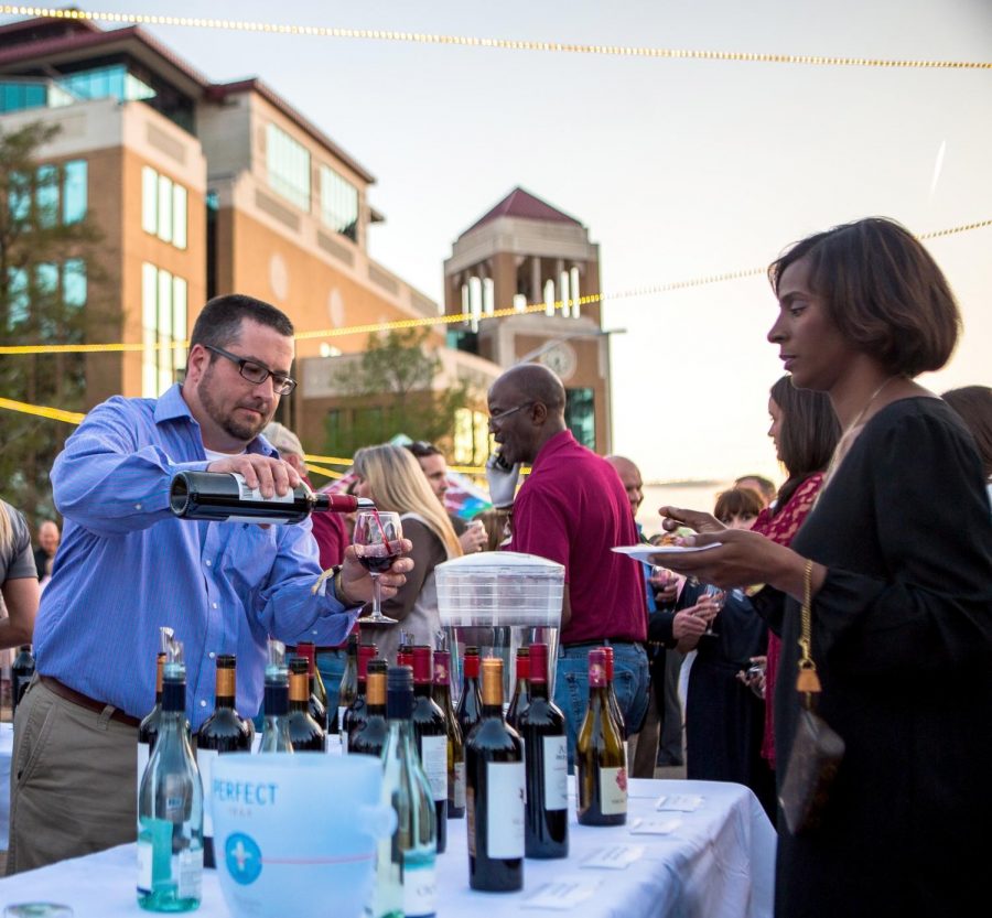 Bayou lights up with wine, food, music: Annual event raises funds for scholarship