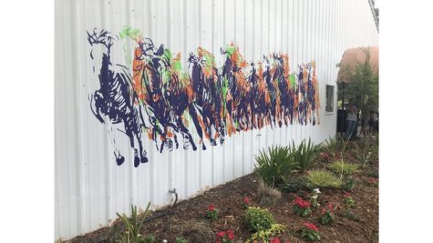 Local zoo unveils mural, receives donations