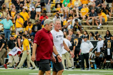 Pederson, Favre meet for cointoss
