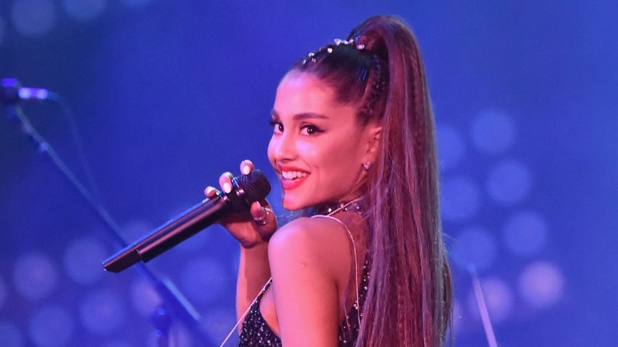 Ariana Grande heals hearts, breaks records