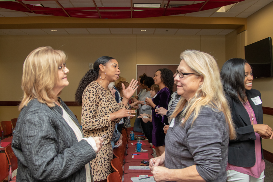 Panelists meet before symposium