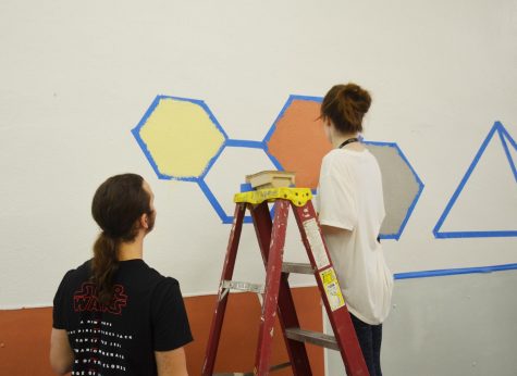 Community unites to paint, uplift local homeless shelter