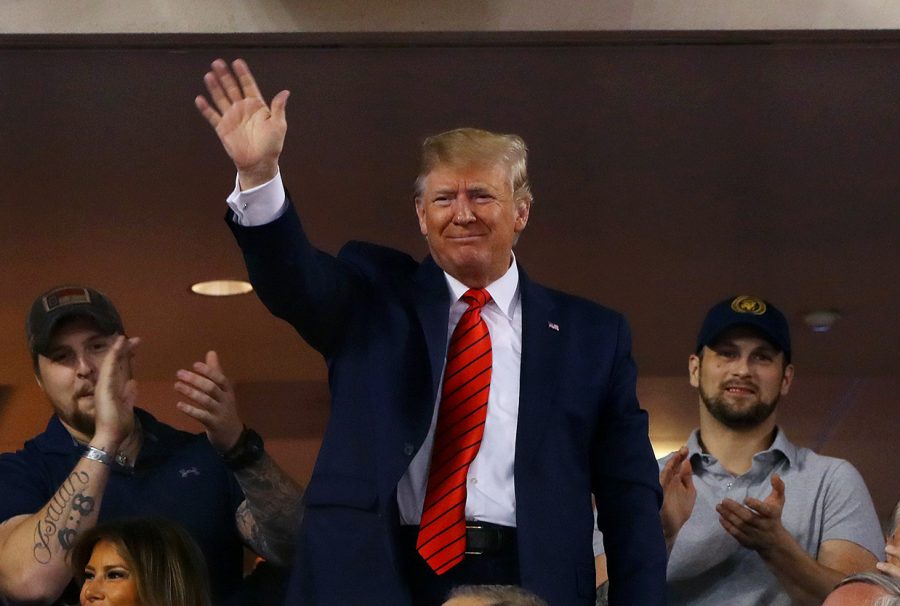 U.S. President Donald Trump acknowledges the crowd during Game 5 of the 2019 World Series between the Houston Astros and the Washington Nationals on Sunday, Oct. 27, 2019 at Nationals Park in Washington, D.C. (Alex Trautwig/MLB Photos via Getty Images/TNS)
