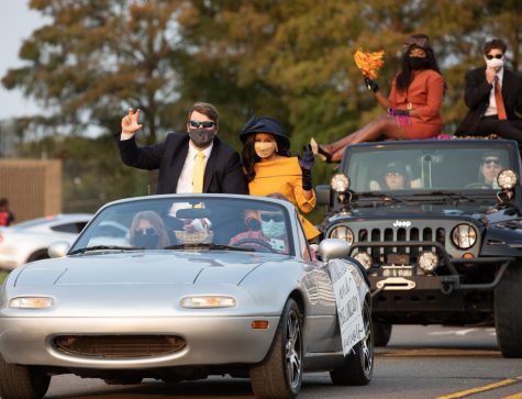 Homecoming court parades in style