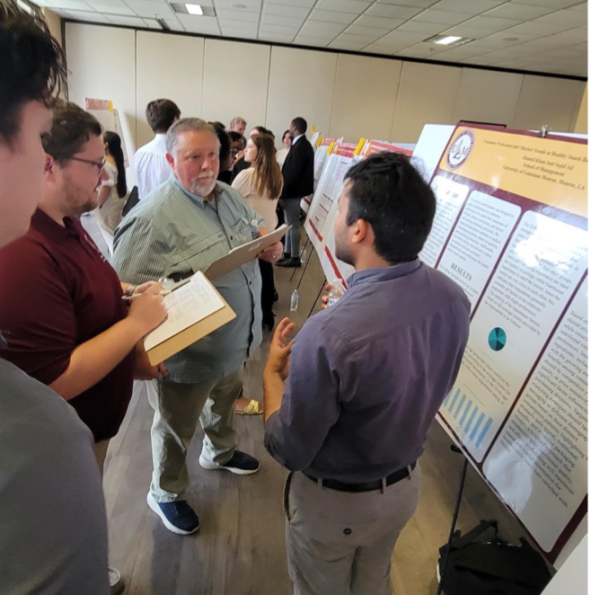 PATHWAY TO SUCCESS: Students presented their semester-long research to a panel of judges. 