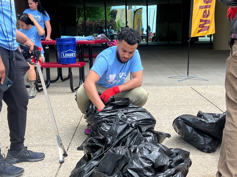 REUSE, REDUCE, RECYLCE: Students filled trash bags with pieces of litter found on campus. 