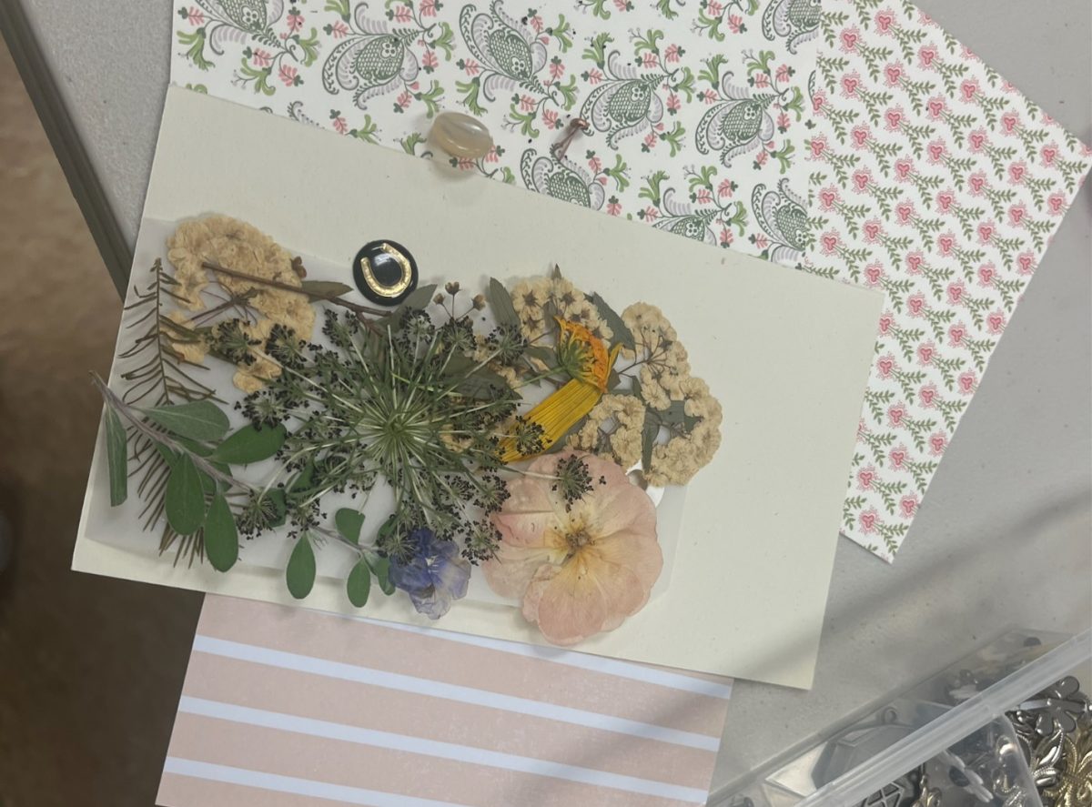 SMELL THE FLOWERS: Attendees made collages from hand-pressed flowers. 