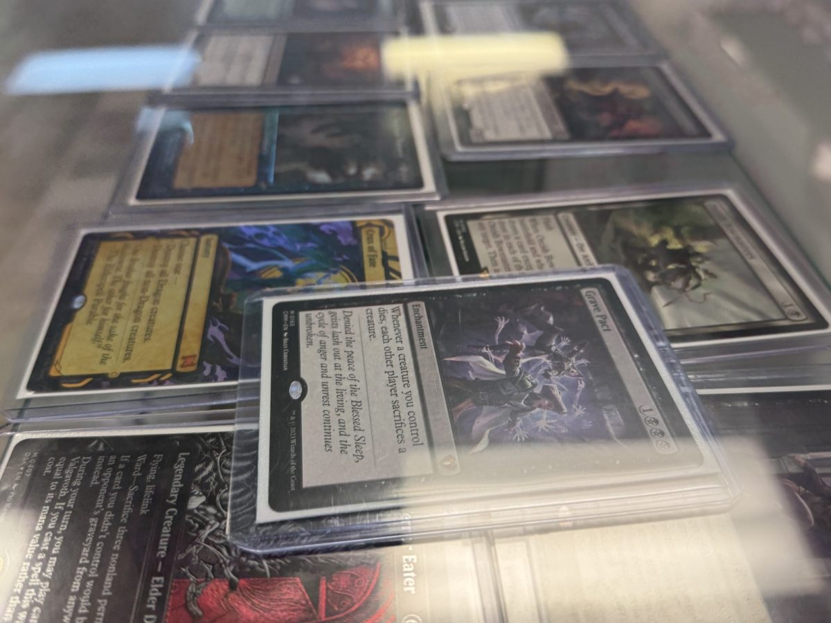 A cabinet full of trading card singles ready to be purchased and added to your decks