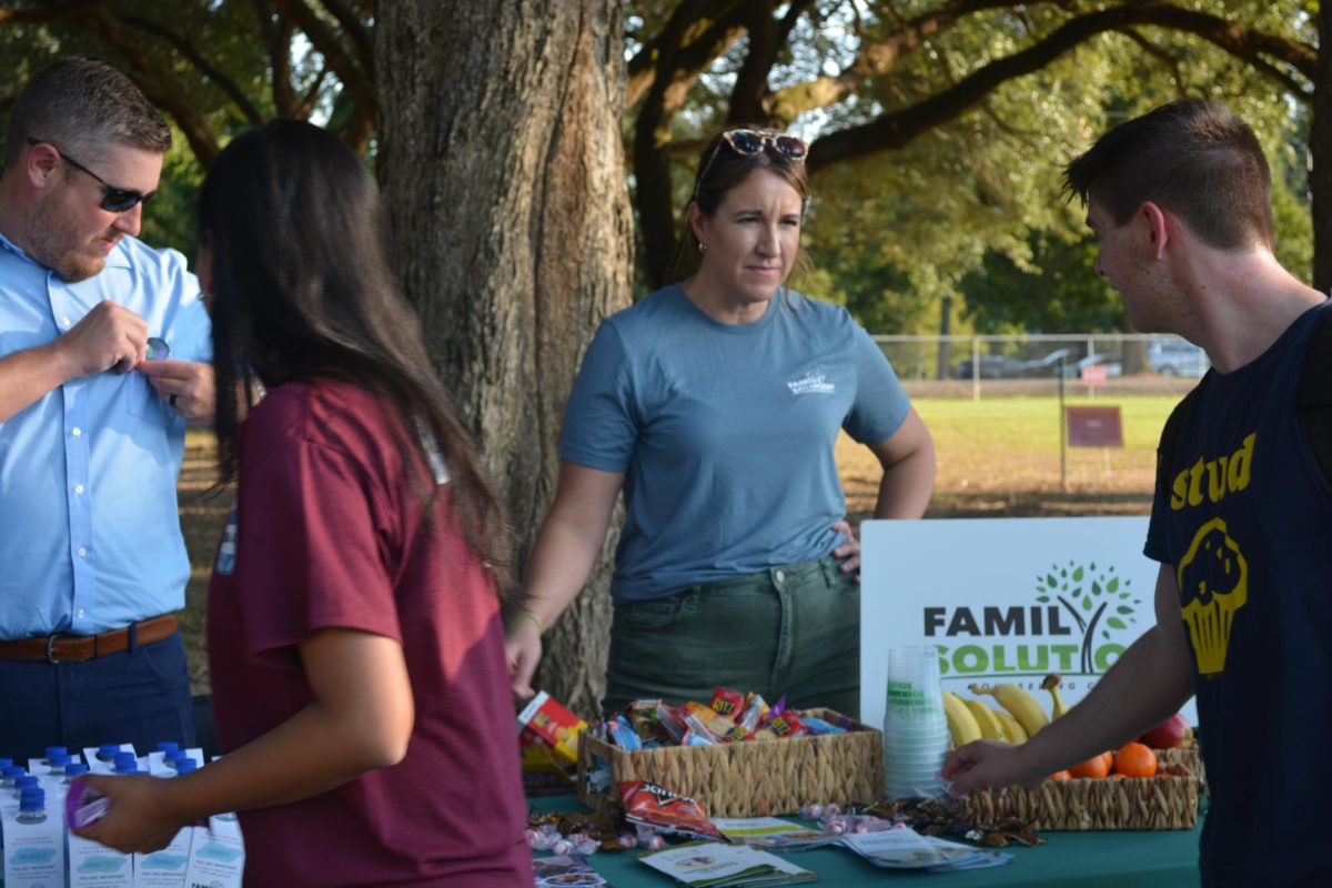 Students enjoying the healthy foods provided by Family Solutions Counseling Center located in Monroe.  
