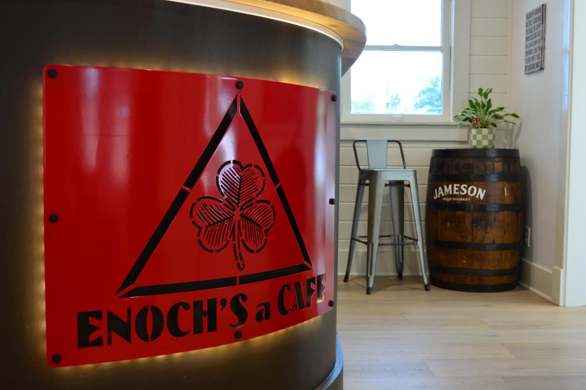 Enoch Café beautiful sign featuring their signature, the clover. 