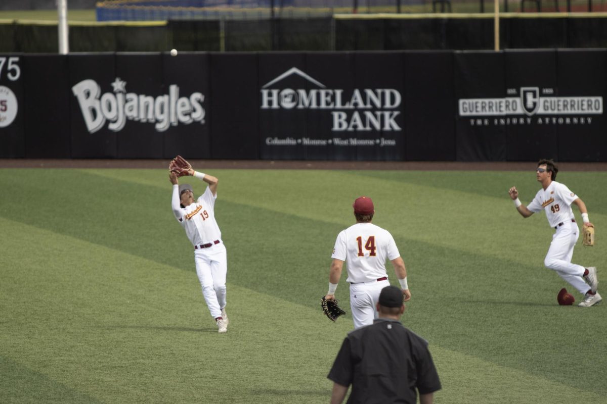 ULM baseball Infielder #19 Dayne Wray catching a pop fly.