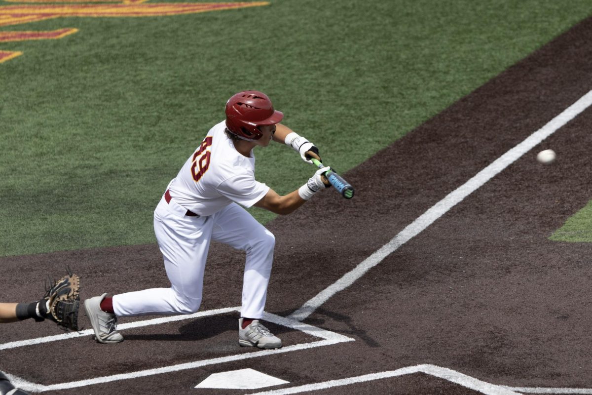 ULM baseball Outfielder #49 Garrett Wiethorn going for the bunt.