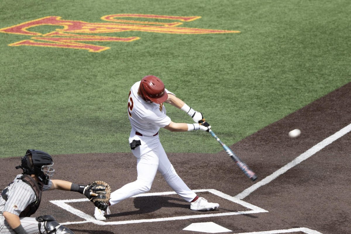 ULM baseball Outfielder #12 Micah Dean swinging for the stars.